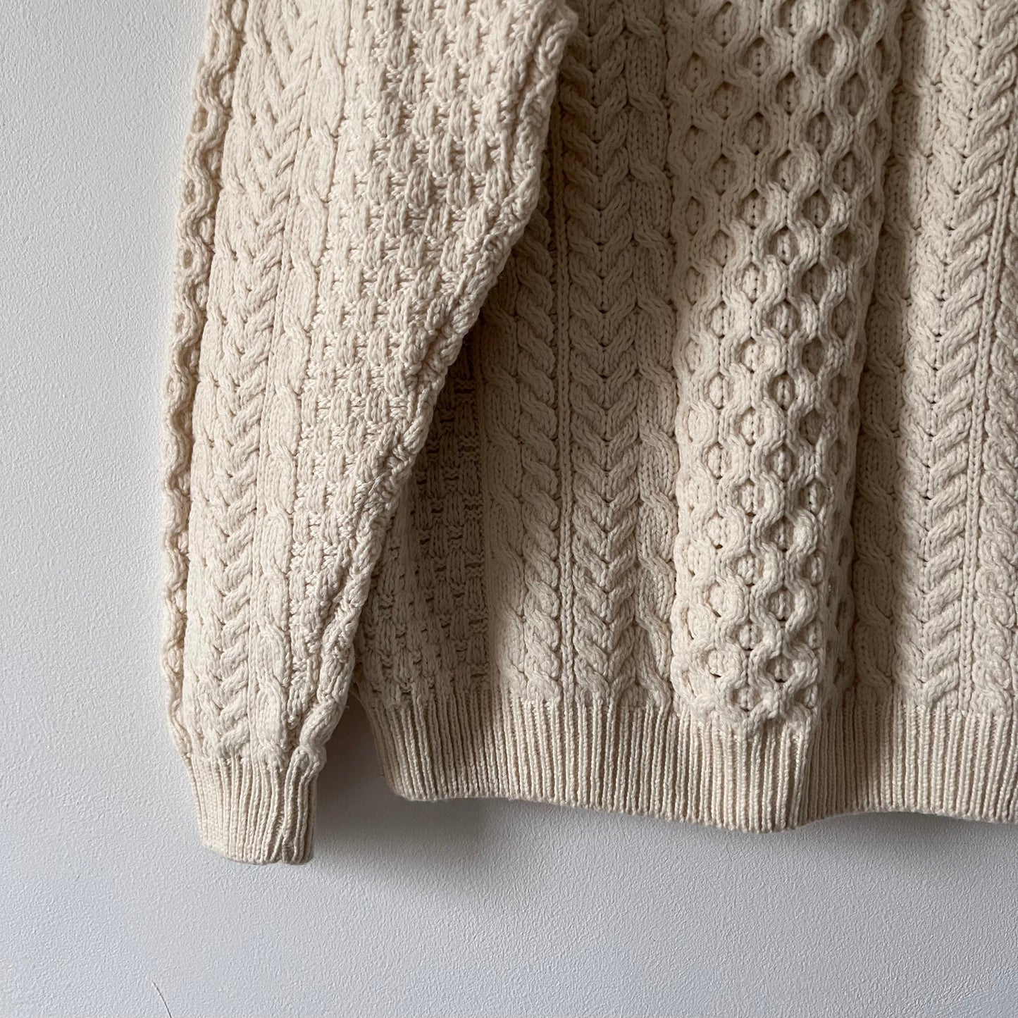 Cable knit merino wool cream cardigan