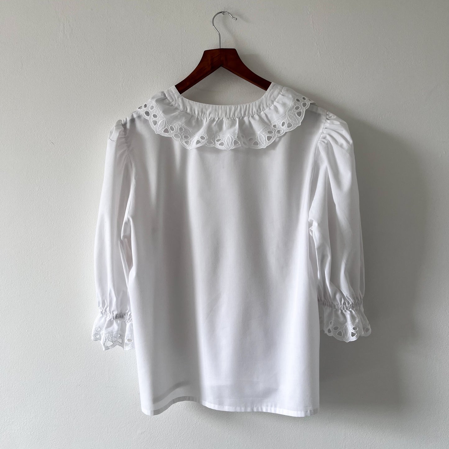 Vintage white blouse with ruffled neckline