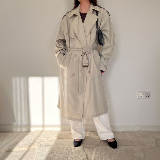 Beige double breasted trench coat