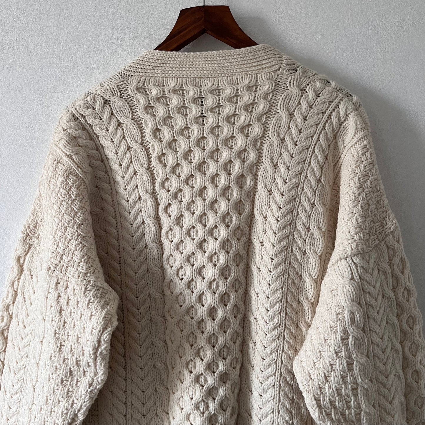 Cable knit merino wool cream cardigan