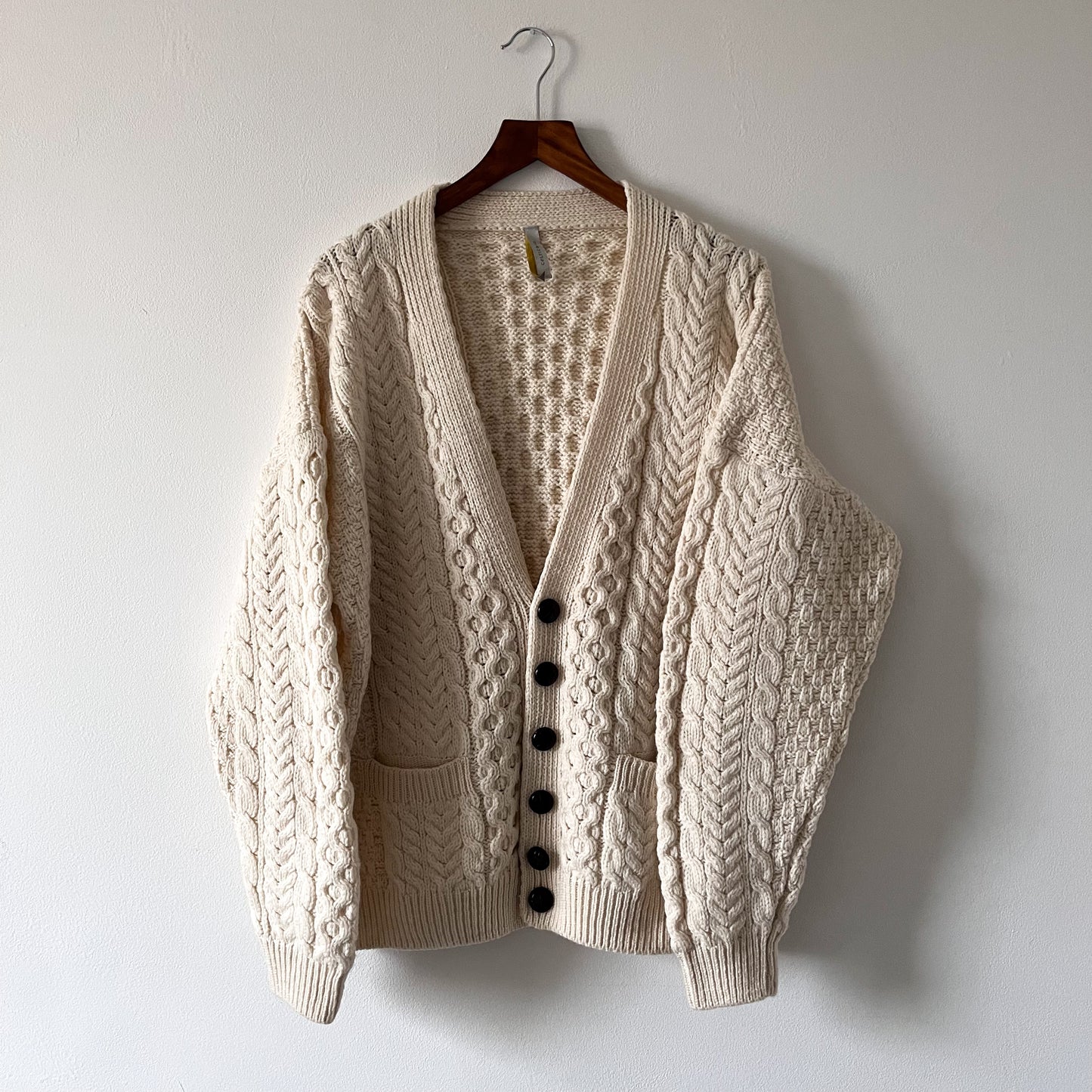 Cable knit merino wool cream cardigan