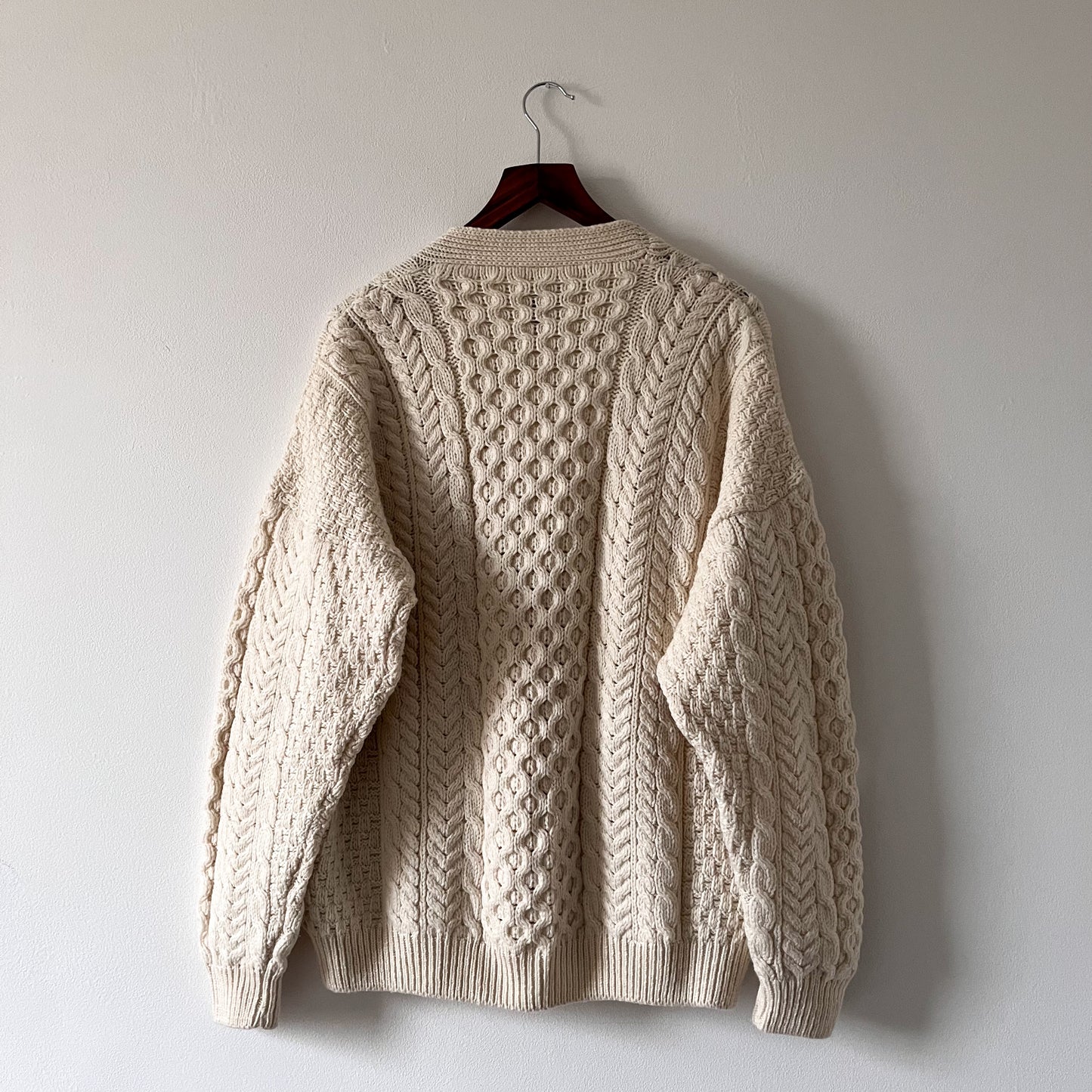 Cable knit merino wool cream cardigan