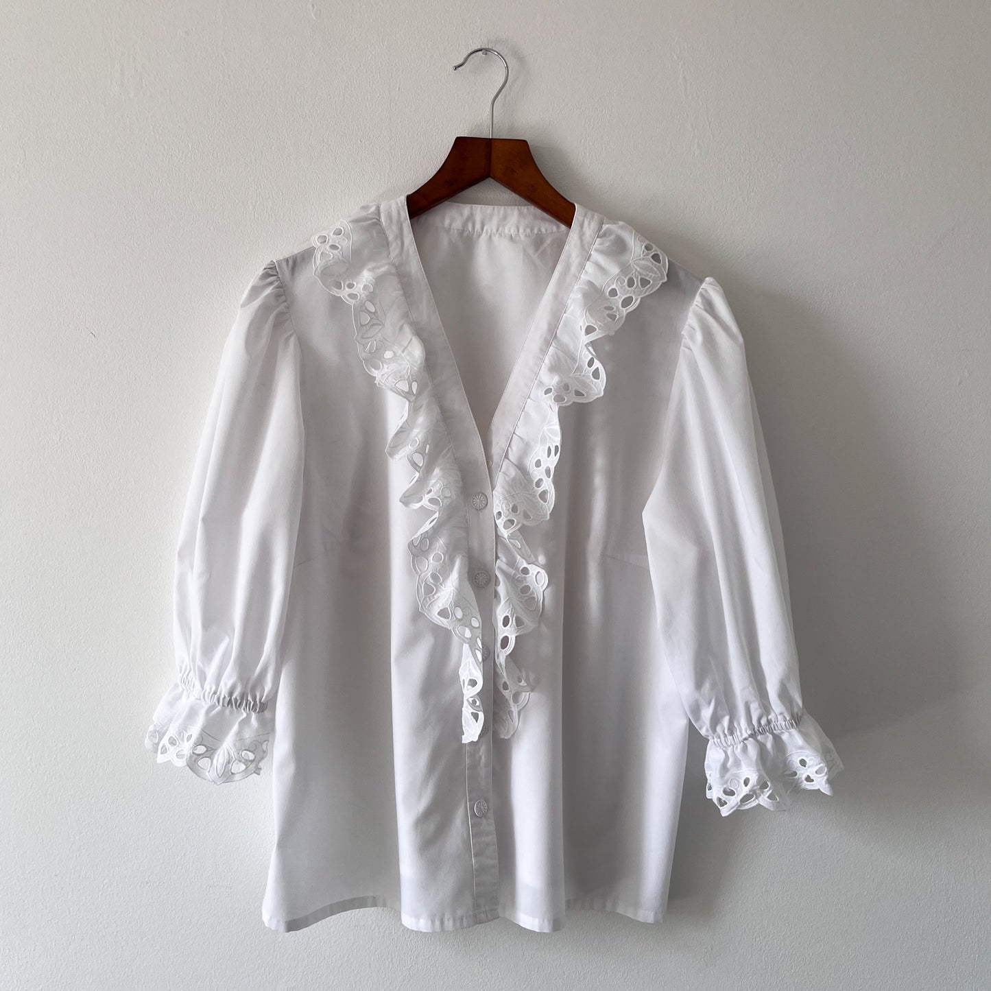 Vintage white blouse with ruffled neckline