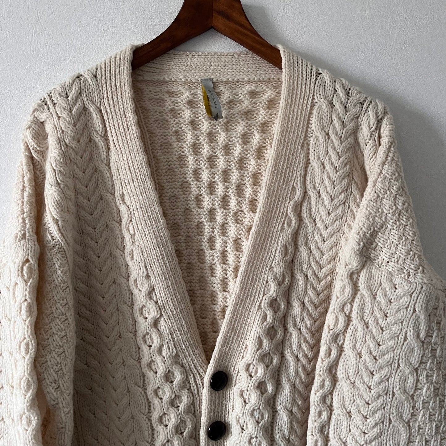 Cable knit merino wool cream cardigan